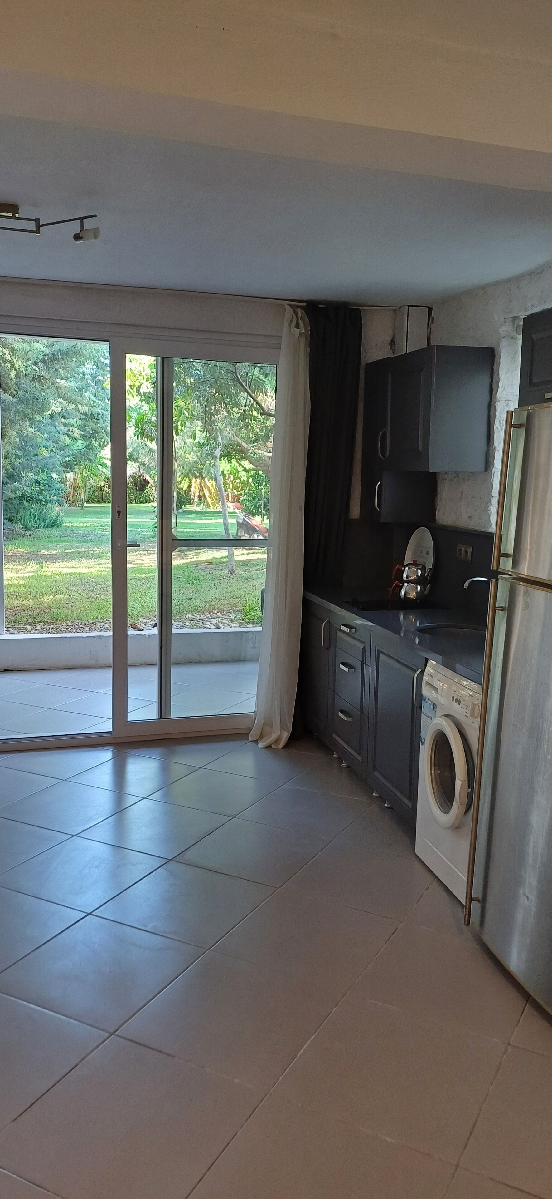 club triple room, garden view | private kitchen | full-sized fridge, dining tables