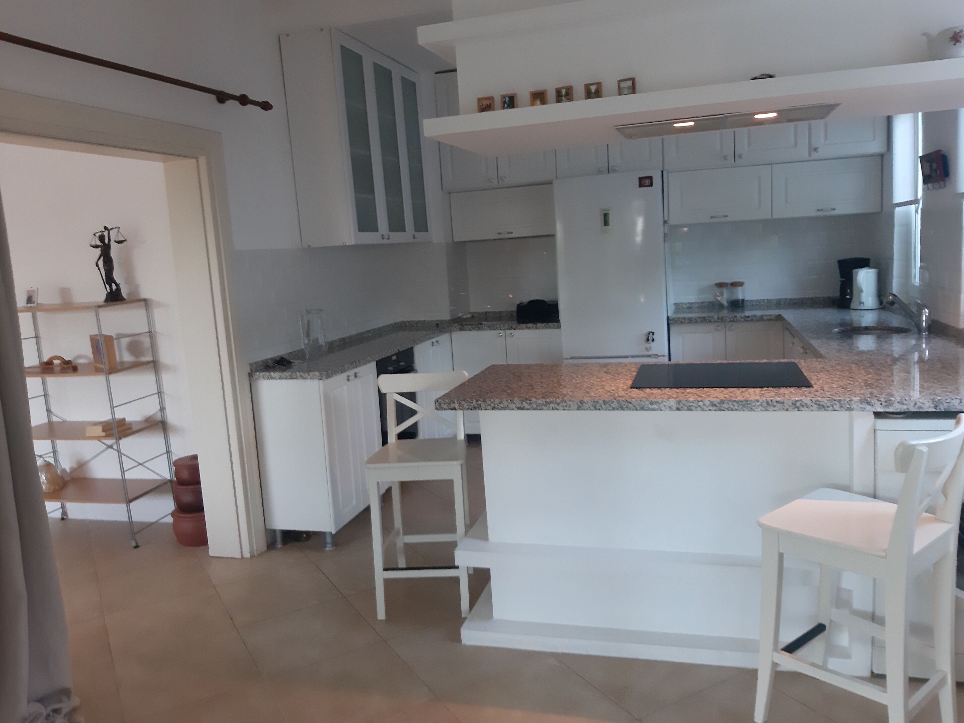 comfort apartment | private kitchen | full-sized fridge, dining tables