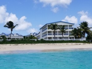 On the beach, sun-loungers, beach towels - Popular Beachfront Condo directly on Simpson Bay beach in St. Maarten (Simpson Bay Village)