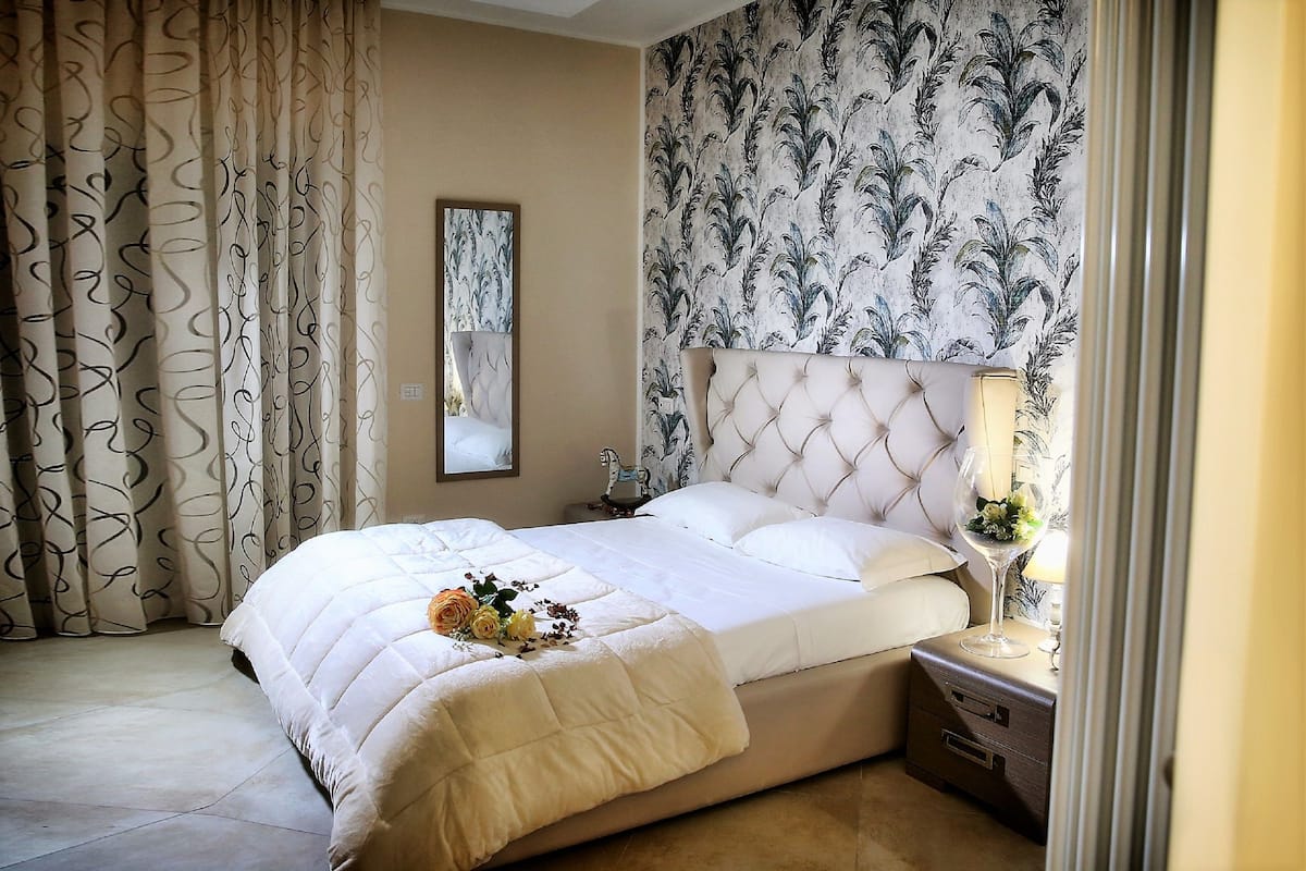 Premium bedding, down duvets, memory-foam beds, minibar