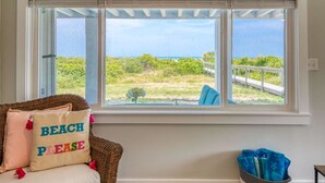 Apartment, Multiple Beds (Barefoot Hideaway II) | Living area | Flat-screen TV - Barefoot Hideaway II (St. Augustine)
