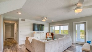 Apartment, Multiple Beds (Barefoot Hideaway II) | Living area | Flat-screen TV - Barefoot Hideaway II (St. Augustine)