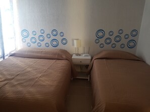 Departamento familiar, varias camas | Cortinas blackout, tabla de planchar con plancha y wifi gratis 