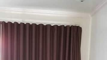 Desk, blackout drapes, free WiFi, bed sheets