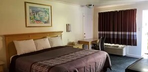 Escritorio, cortinas opacas, wifi gratis y ropa de cama