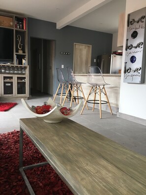 Appartement Exclusif, plusieurs lits, vue jardin | Coin séjour