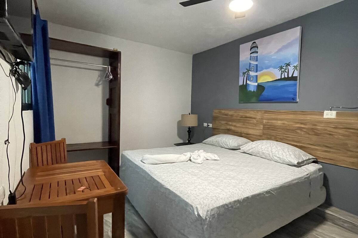 Economy Room | Laptop workspace, blackout drapes, WiFi (free), individually decorated