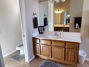 Combined shower/bathtub, hair dryer, towels, soap