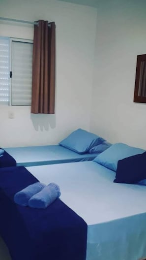 QUARTO TRIPLO STANDARD | Minibar, blackout drapes, free WiFi, bed sheets - Pippo suítes - 110m da praia (Guarujá)