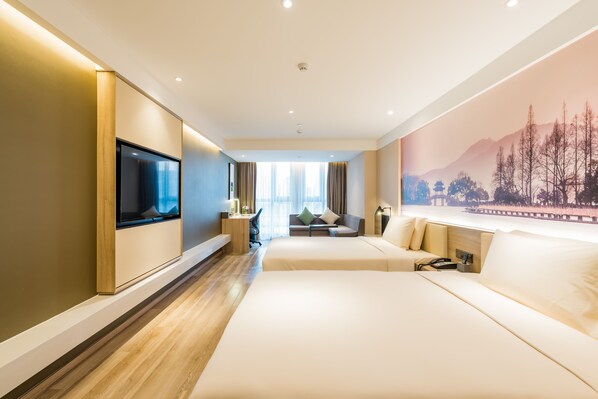 A modern hotel room with a large bed, a desk, a TV mounted on the wall, and a scenic mural on the wall. - Atour Hotel West Lake Cultural Square Shangtang Rd Hangzhou (Hangzhou)