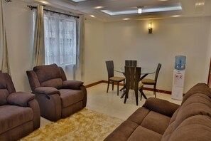 Superior Apartment | Living area | Smart TV