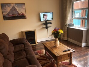 Apartment | Wohnbereich | Flachbildfernseher