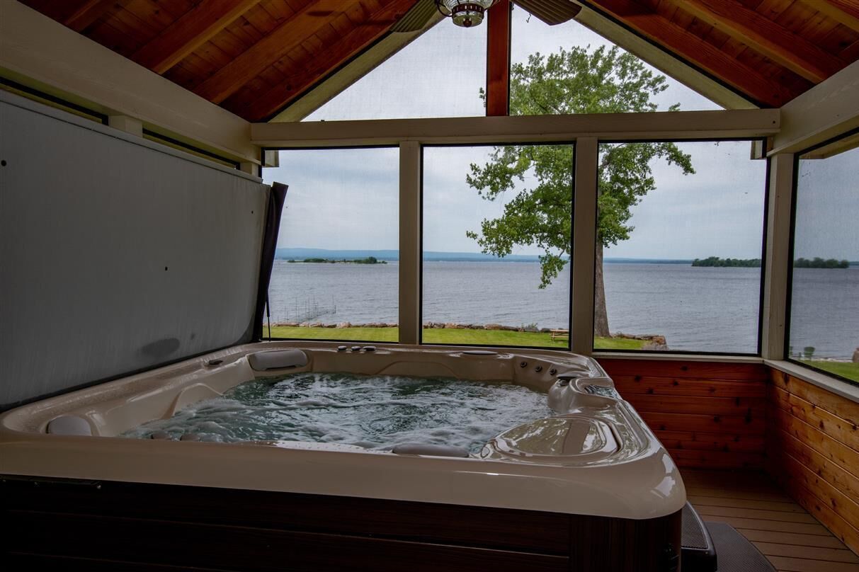Jacuzzi in screened in porch