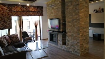 TV, fireplace, video games, table football