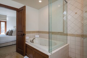 Shower, jetted tub, hair dryer, towels
