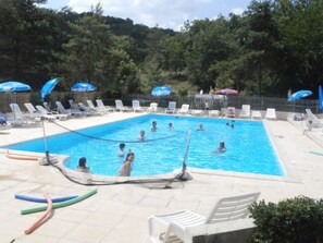 Seasonal outdoor pool, a heated pool, sun loungers