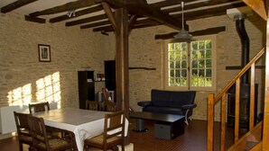 Cottage, 3 Bedrooms (Tournesol) | Living area | Flat-screen TV, fireplace - Camping La Castillonderie - Gites (Thonac)