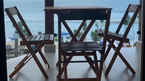 Tremannsrom – deluxe, strandutsikt | Utsikt fra balkong