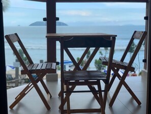 Quarto triplo luxo, vista para a praia | Vista da sacada