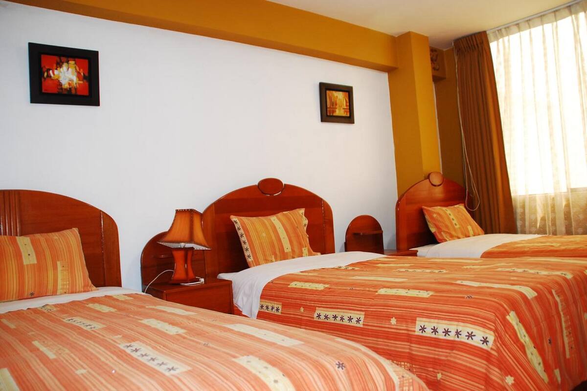 Quadruple Room, Multiple Beds | 1 bedroom, individually decorated, individually furnished, desk