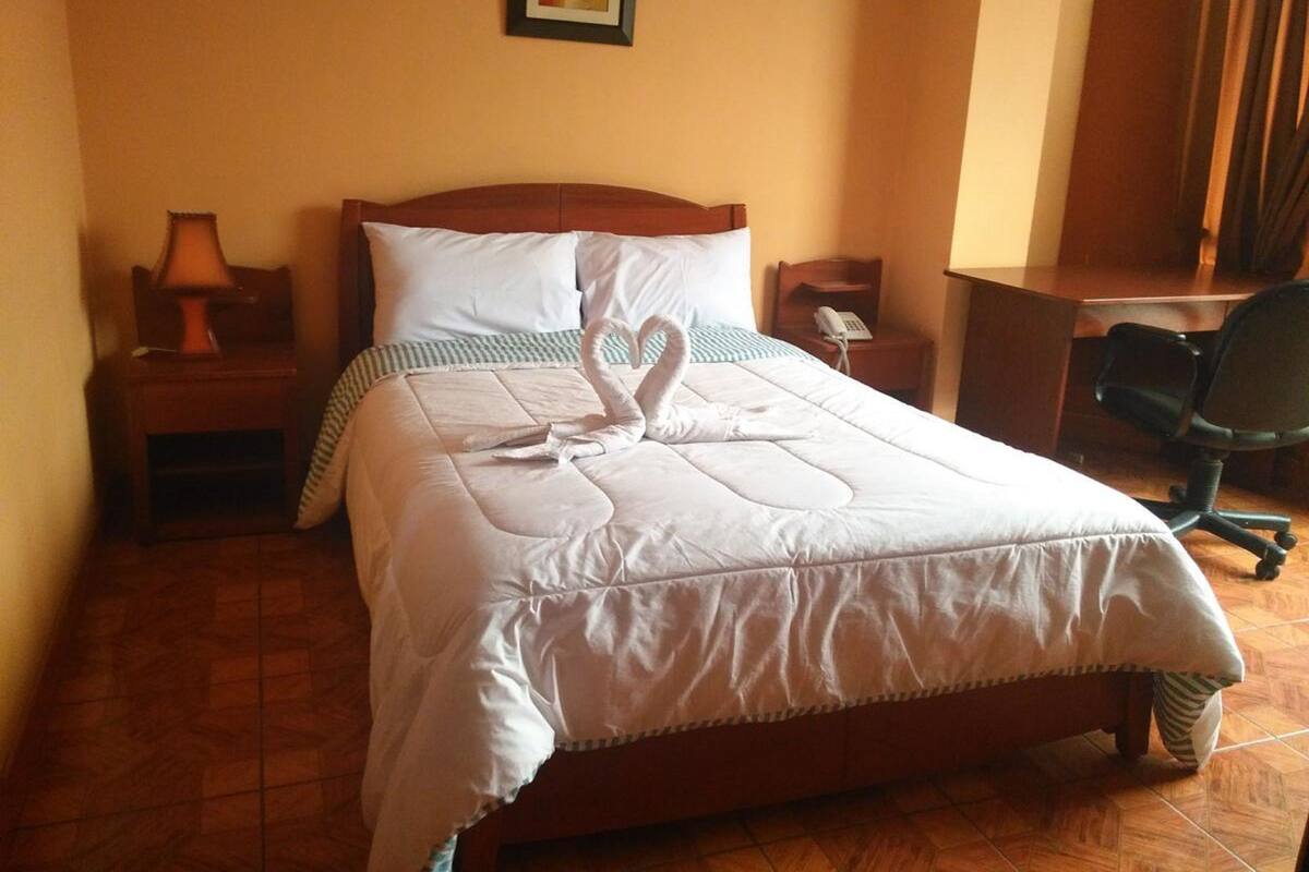 Room, 1 Queen Bed | 1 bedroom, individually decorated, individually furnished, desk