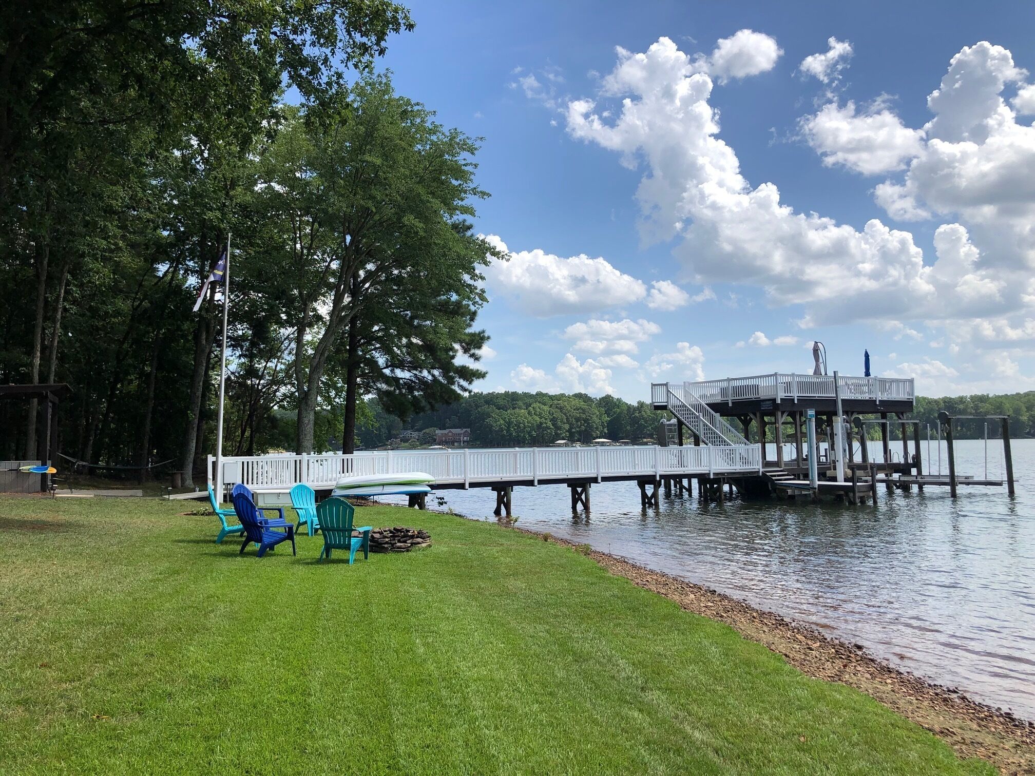 Lakefront, sunsets, dock slide and more at Heron House!