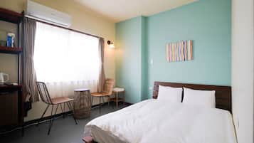 Economy Room, 1 Bedroom, Non Smoking, Refrigerator & Microwave | Desk, laptop workspace, free WiFi, bed sheets