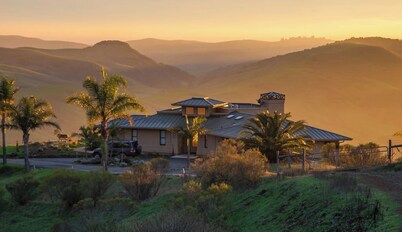 An aesthetic delight high above Cambria steeped in nature but close to town.