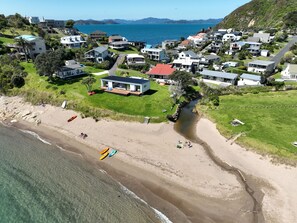 On the beach, sun loungers, beach towels