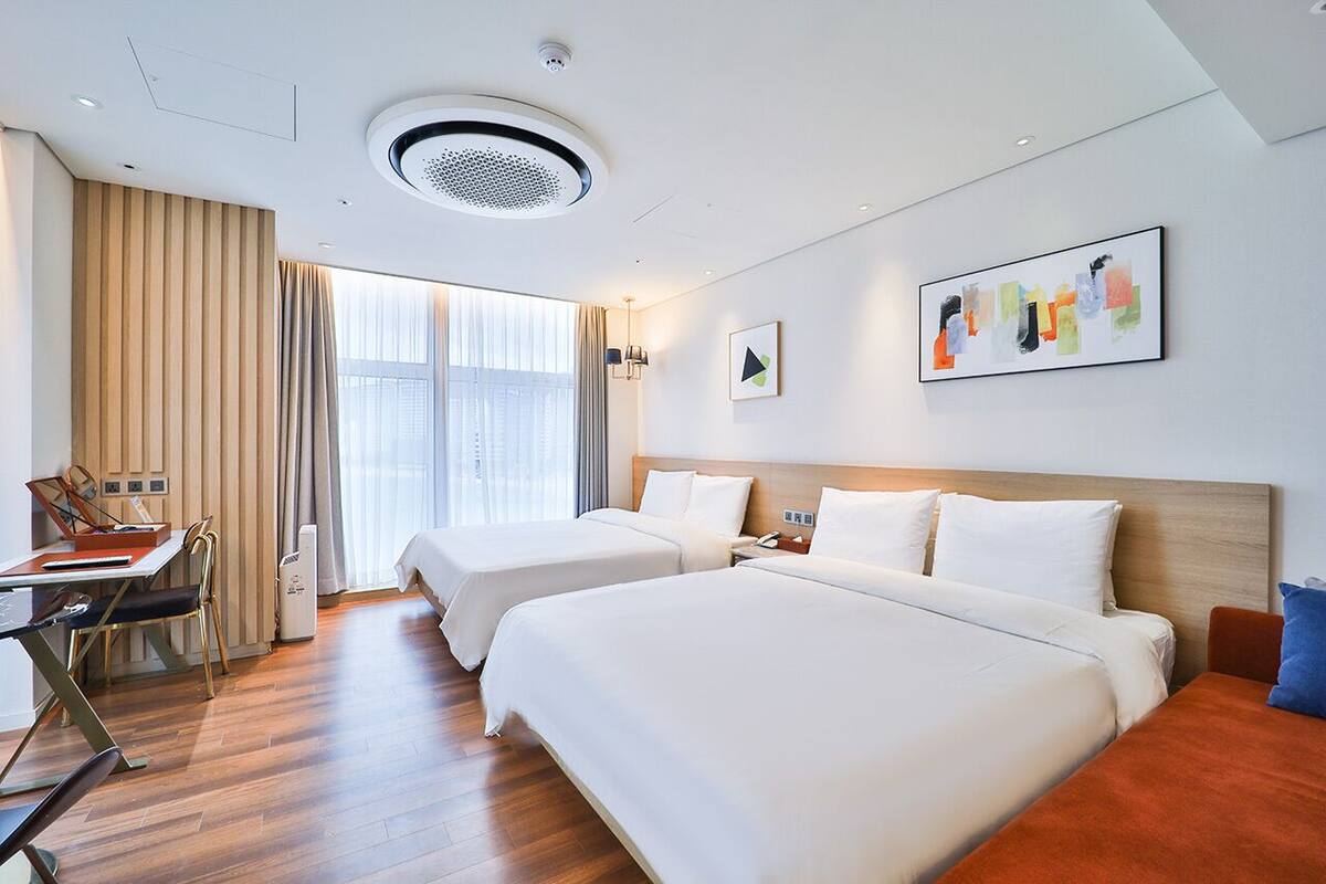 家庭雙床房, 非吸煙房, 海景 | 義大利 Frette 床單、高級寢具、羽絨被、舒適加層