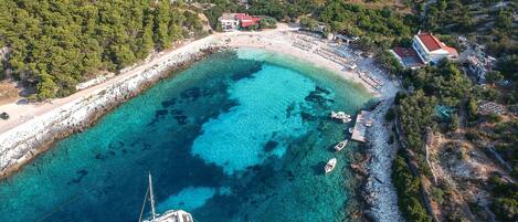 On the beach, sun loungers