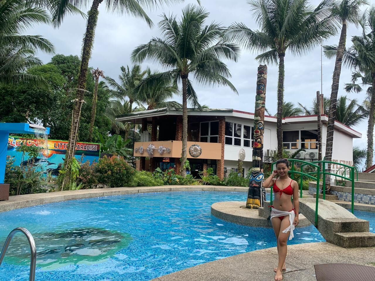 Outdoor pool, open 6:00 AM to 10:00 PM, sun loungers