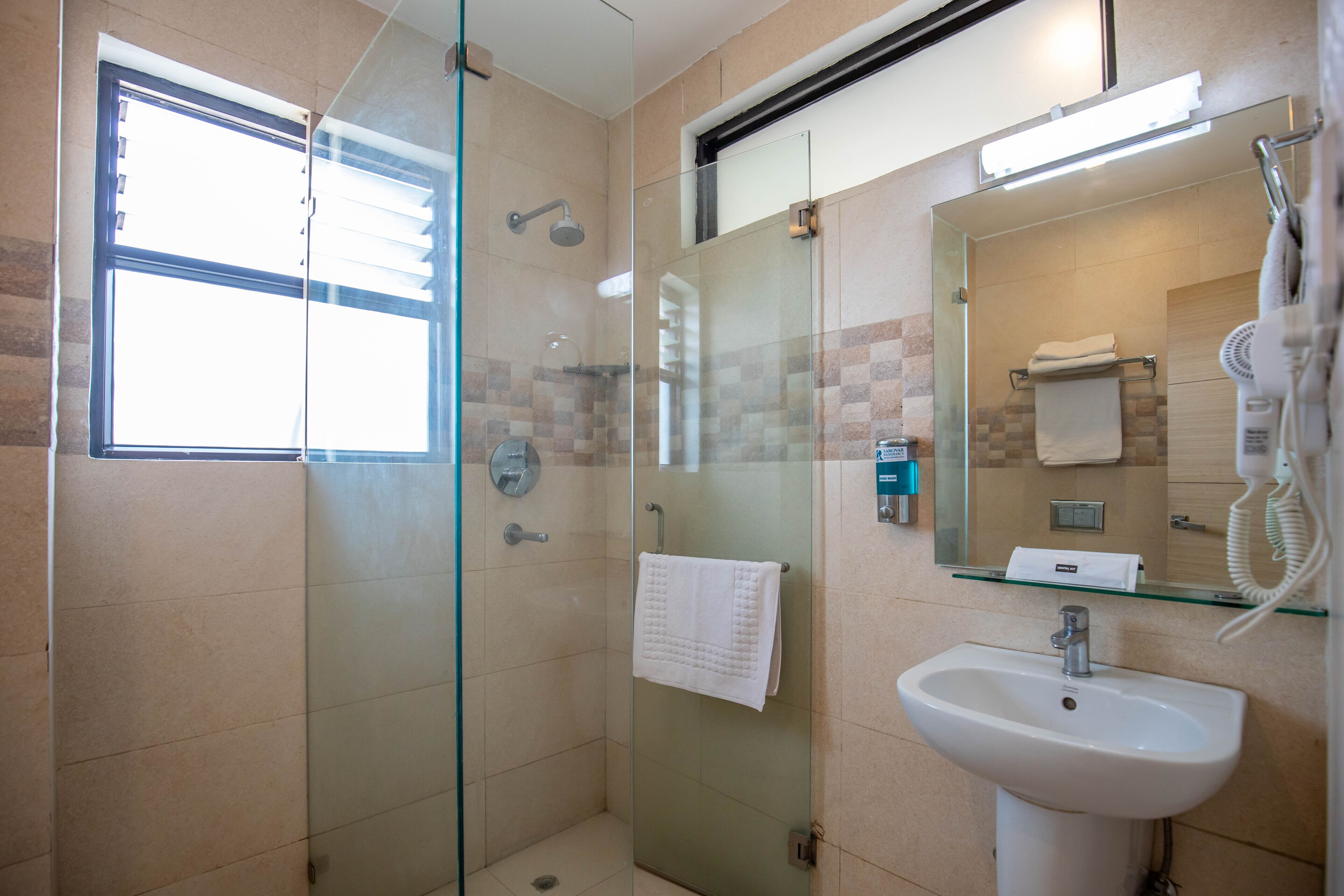 2 BHK Queen Suite Apartment | Bathroom | Shower, designer toiletries, hair dryer, slippers