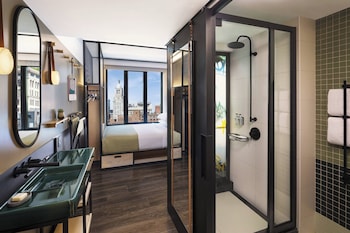 Egyptian cotton sheets, premium bedding, in-room safe, laptop workspace at Moxy NYC East Village
