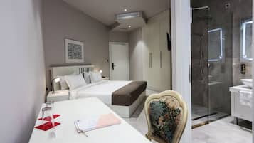 Hypo-allergenic bedding, in-room safe, desk, laptop workspace