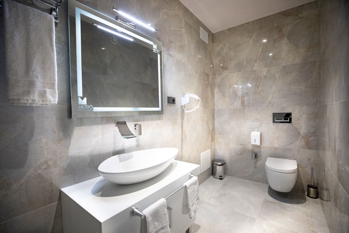 shower, free toiletries, hair dryer, slippers