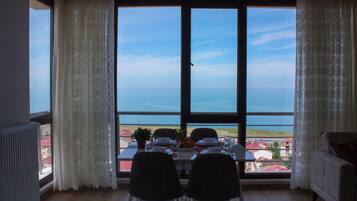 Classic Apartment, Multiple Beds, Sea View | Living room | 80-inch LCD TV with satellite channels, TV