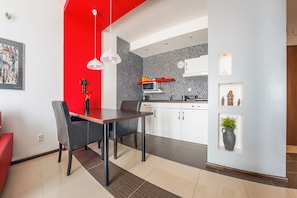 Apartment (3) | Private kitchenette | Fridge, stovetop, electric kettle, highchair