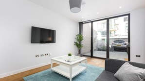 Townhome - flera sängar | Vardagsrum | Platt-tv