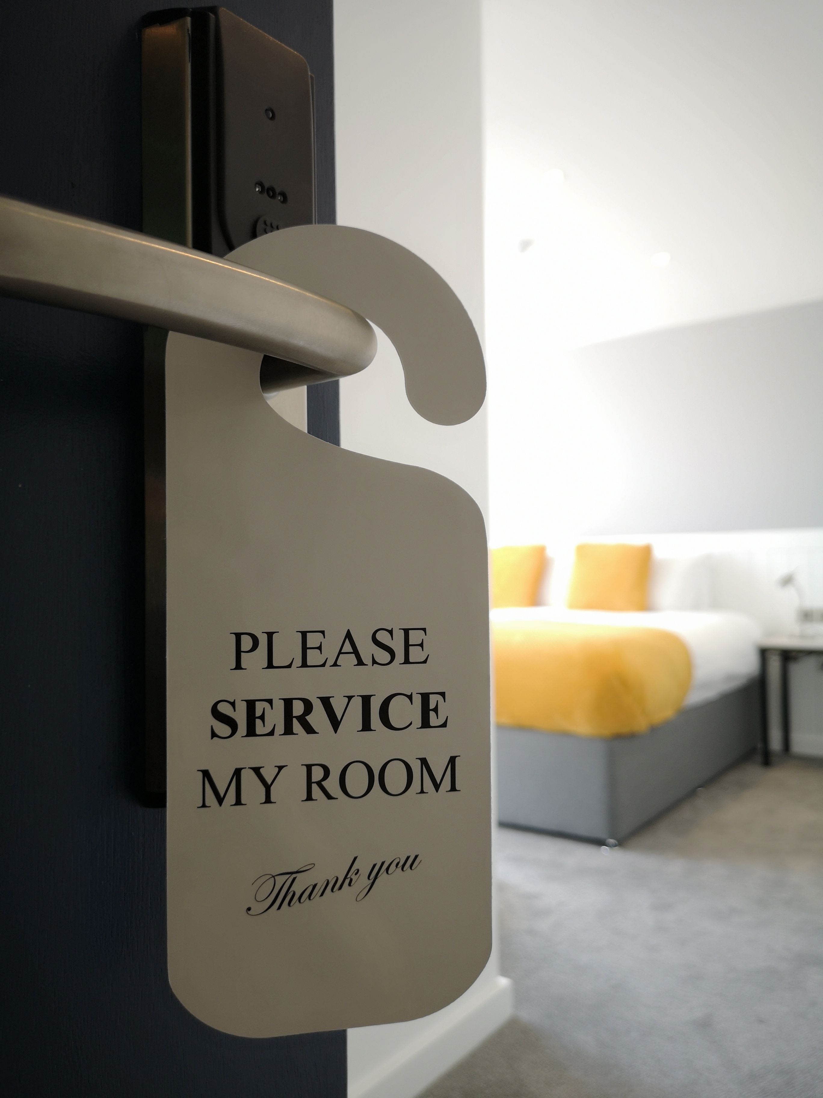 premium bedding, desk, laptop workspace, blackout curtains