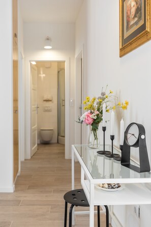Combined shower/tub, hair dryer, towels, soap