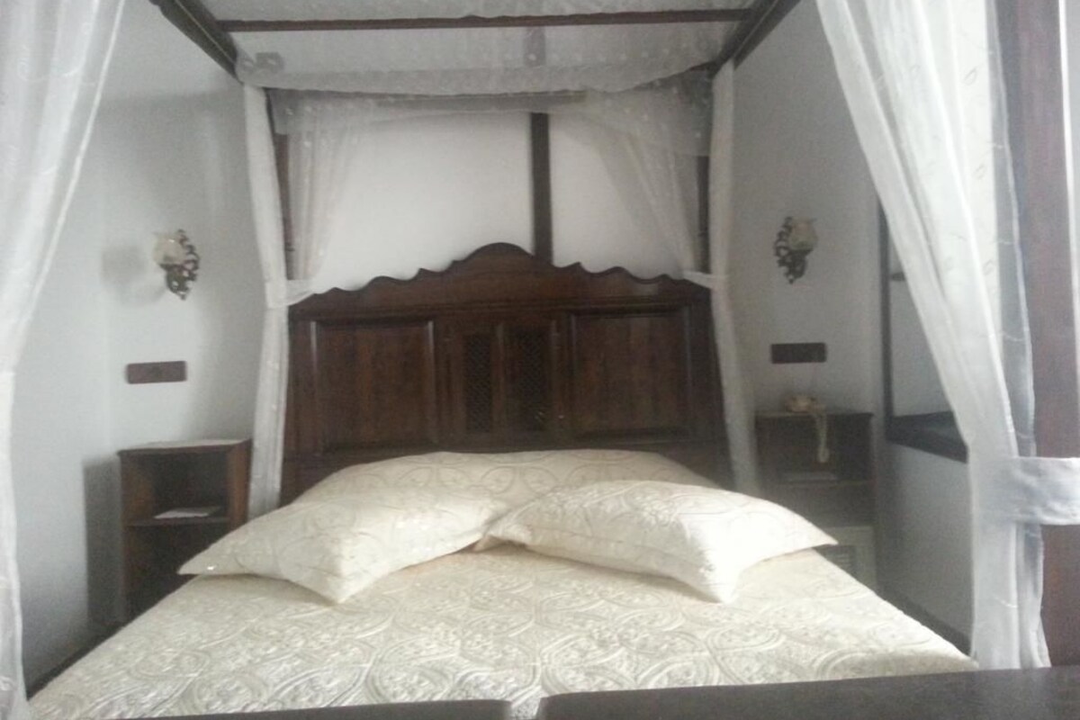 Standaard tweepersoonskamer, uitzicht op tuin | Extra bedden, gratis wifi, beddengoed