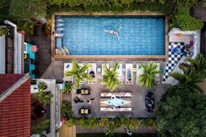 Outdoor pool, open 7:00 AM to 11:00 PM, pool umbrellas, pool loungers
