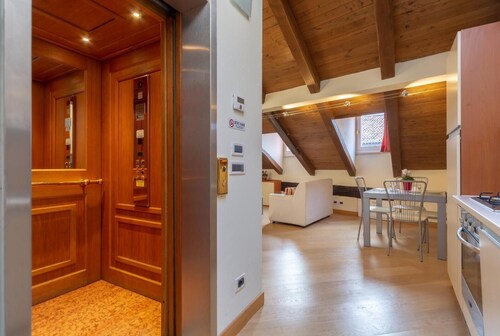Santo Stefano Apartments- Attic with Terrace