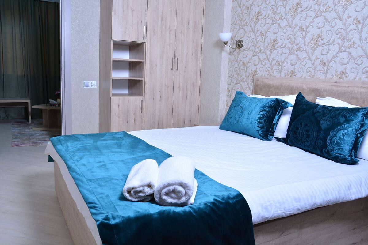 Deluxe Double Room, 1 Queen Bed, Courtyard View | 2 bedrooms, minibar, blackout drapes, iron/ironing board