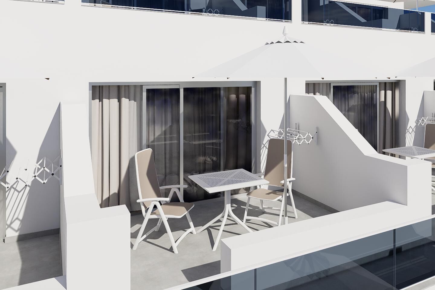 A modern outdoor seating area with white furniture and a glass partition.