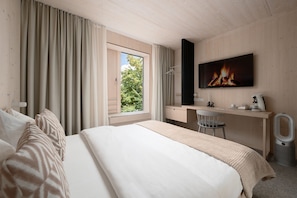 Hypo-allergenic bedding, desk, laptop workspace, blackout curtains