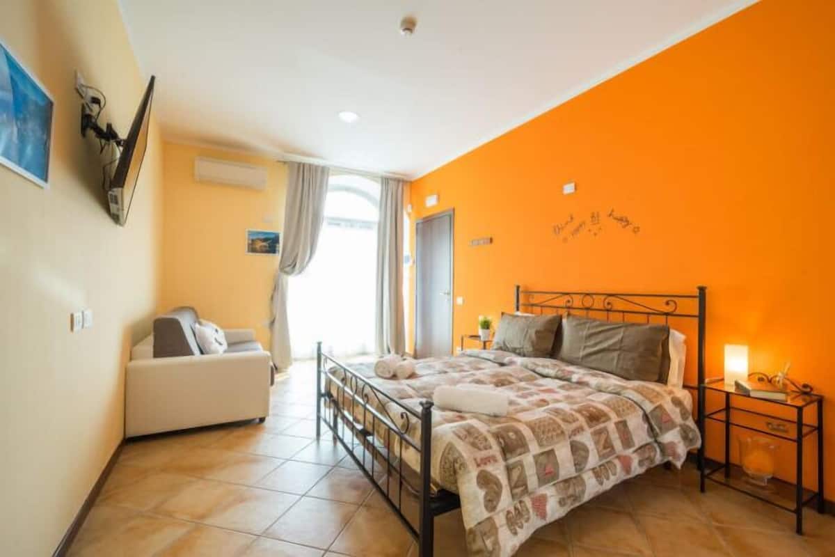 Room, 1 Double Bed with Sofa bed (MANDELLO 3) | Desk, blackout curtains, free cots/infant beds, free WiFi