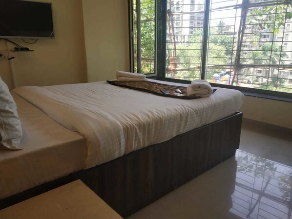 Basic Room | 1 bedroom, premium bedding, in-room safe, soundproofing - Hotel Lalsai Residency Andheri (Mumbai)