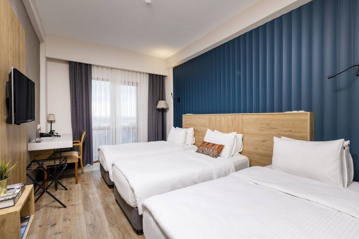 Chambre Triple, vue jardin
